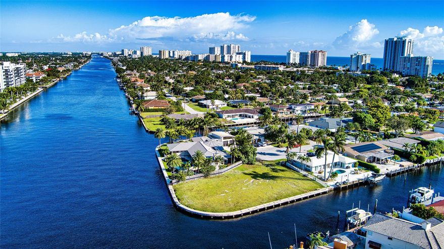 Rare Intracoastal Point Lot sited on 221’+/- of wraparound waterfrontage in the prestigious gated enclave of Bel-Air Isles. With a full set of building plans included to build a 6,492 SqFt+/- luxury home, this .33 acre+/- lot is positioned ideally for the construction of your next dream estate. Located between East Pompano Beach’s revitalized Atlantic Boulevard and Lauderdale-By-The-Sea, this property offers convenient access to the beach, as well as close proximity to exceptional shoppes and restaurants. Ideal for boating enthusiasts, this southwest facing lot can accommodate a large, 100’+ vessel providing easy ocean access with no fixed bridges.