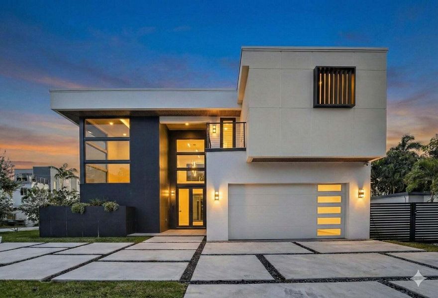 Contemporary Perfection in Victoria Park: A Glass & Light Sanctuary- Experience the pinnacle of modern luxury in Fort Lauderdale's most coveted neighborhood, Victoria Park. This stunning new contemporary construction sits on a rare, expansive 7,702 sq. ft. corner lot, offering a level of privacy and space rarely found in the city. Designed with a sophisticated European aesthetic, the home features striking dark finishes that contrast beautifully with an abundance of natural light. The interior drama is anchored by a breathtaking glass catwalk and dual skylights that flood the core of the home with sunshine. Walls of oversized triple-pane hurricane impact windows blur the lines between indoors and out, creating a surreal, airy atmosphere. Function meets high design on the main level, which hosts a modern, sleek kitchen with a butler's pantry and two versatile bedrooms. One is currently configured as an executive office, offering a private retreat with its own Zen garden and direct access to the pool area. Outside, the grounds are an entertainer's dream, featuring a sparkling swimming pool with a cascading waterfall. The residence is completed by a voluminous two-car garage, specifically engineered to accommodate two full-sized SUVs. Walk up the bright, airy staircase past the signature glass catwalk to find the upstairs quarters. The Primary Suite is a showstopper, featuring a beautiful private balcony and a dramatic, long walk-in closet leading to a state-of-the-art modern bathroom. Two generously oversized bedrooms provide ample space for family or guests.