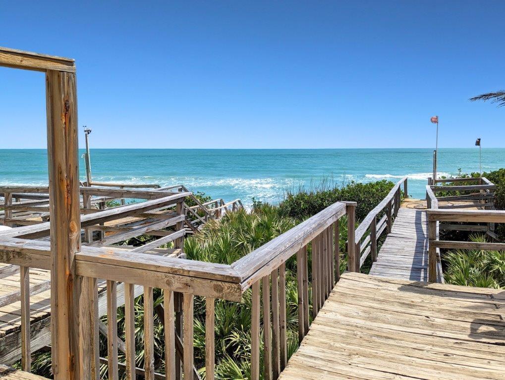 This exceptional property boasts 101 feet of ocean frontage, with two duplexes currently configured as a single family residence. Enjoy breathtaking ocean views and easy access to the beach through three walkways. The four bedroom, five bathroom home also includes a spacious workshop and an extra-large four-car garage. Recent upgrades include a newer roof and air conditioning. With its flexible layout, this property offers endless possibilities. It can be remodeled to function as two separate duplexes or transformed into a spacious single family home. Situated on a generous lot, the property includes a greenhouse and a variety of fruit trees. Moreover, the city owns the adjacent property to the north, ensuring that no new construction will ever block your view. All measurement are estimate