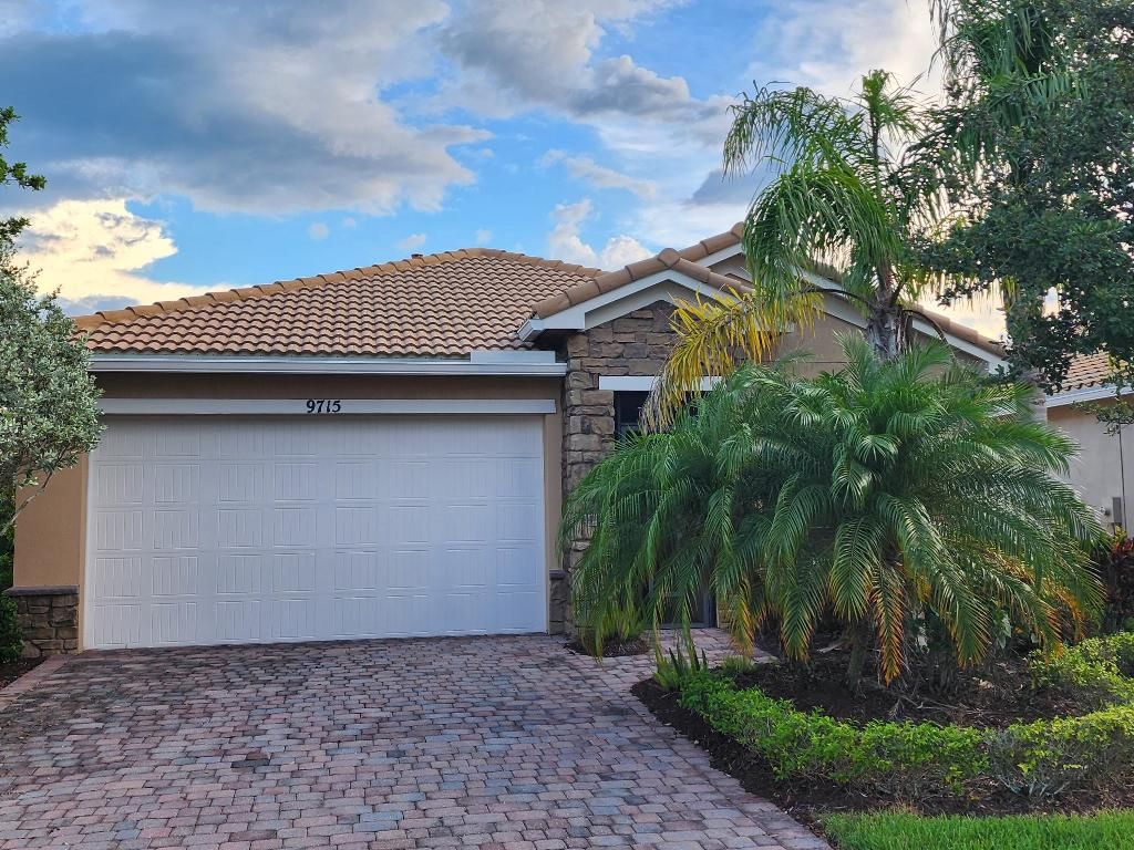 Photo of 9715 SW Royal Poinciana Drive, Port Saint Lucie, FL 34987 (MLS # R10996986)