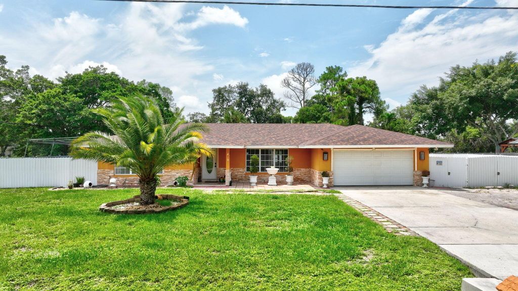 Photo of 499 SE Calmoso Drive, Port Saint Lucie, FL 34983 (MLS # R11010822)