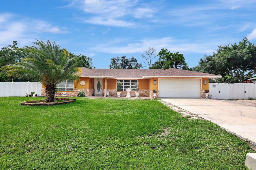 Photo of 499 SE Calmoso Drive, Port Saint Lucie, FL 34983 (MLS # R11010822)