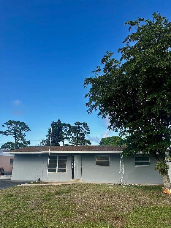 Photo of 790 Sarazen Drive, West Palm Beach, FL 33413 (MLS # R11144212)
