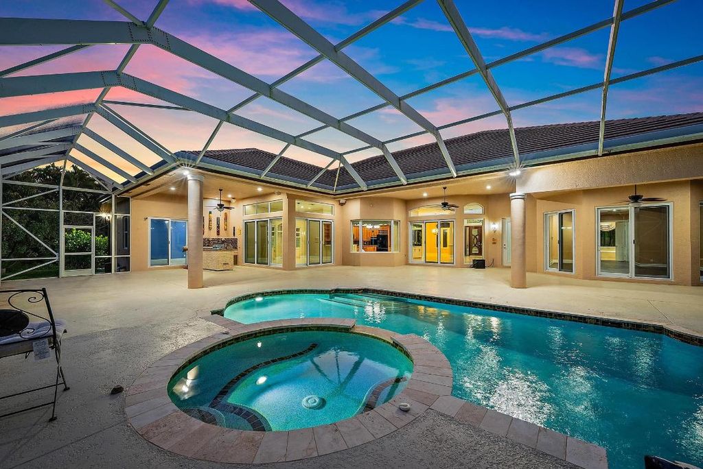 Photo of 8480 Man O War Road, Palm Beach Gardens, FL 33418 (MLS # R11155018)