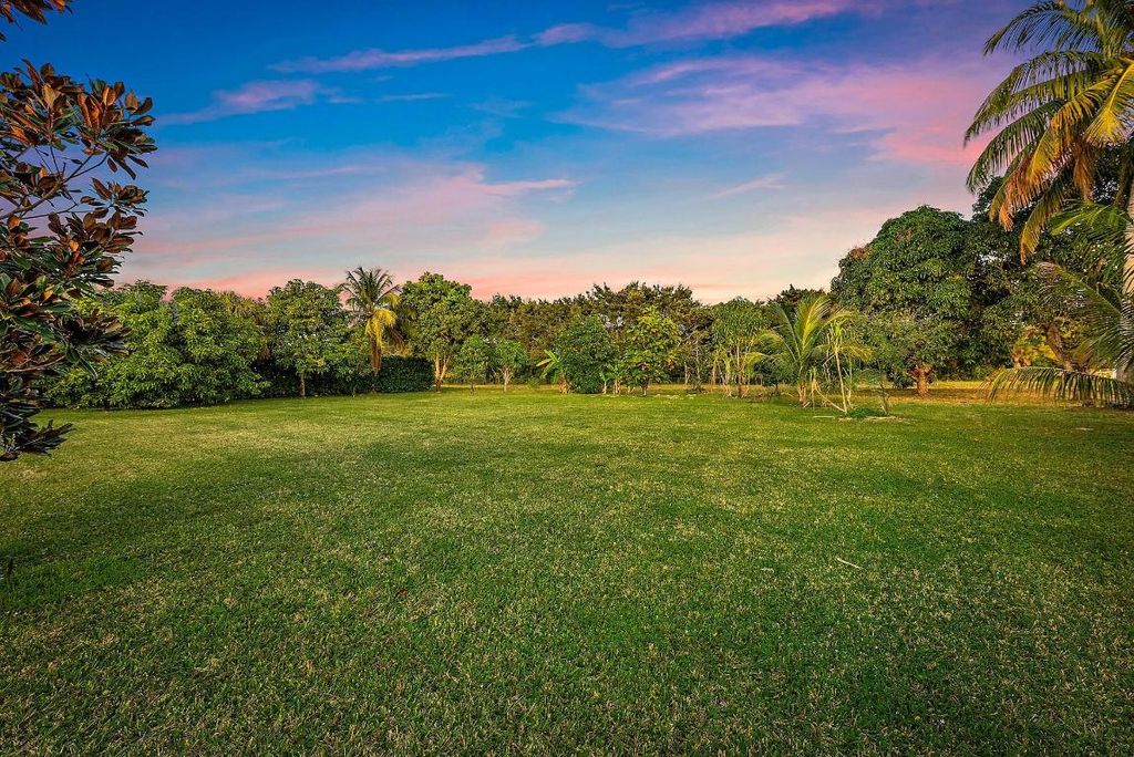 Photo of 8480 Man O War Road, Palm Beach Gardens, FL 33418 (MLS # R11155018)