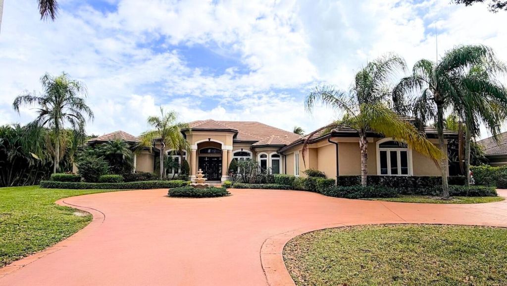 Photo of 8480 Man O War Road, Palm Beach Gardens, FL 33418 (MLS # R11155018)