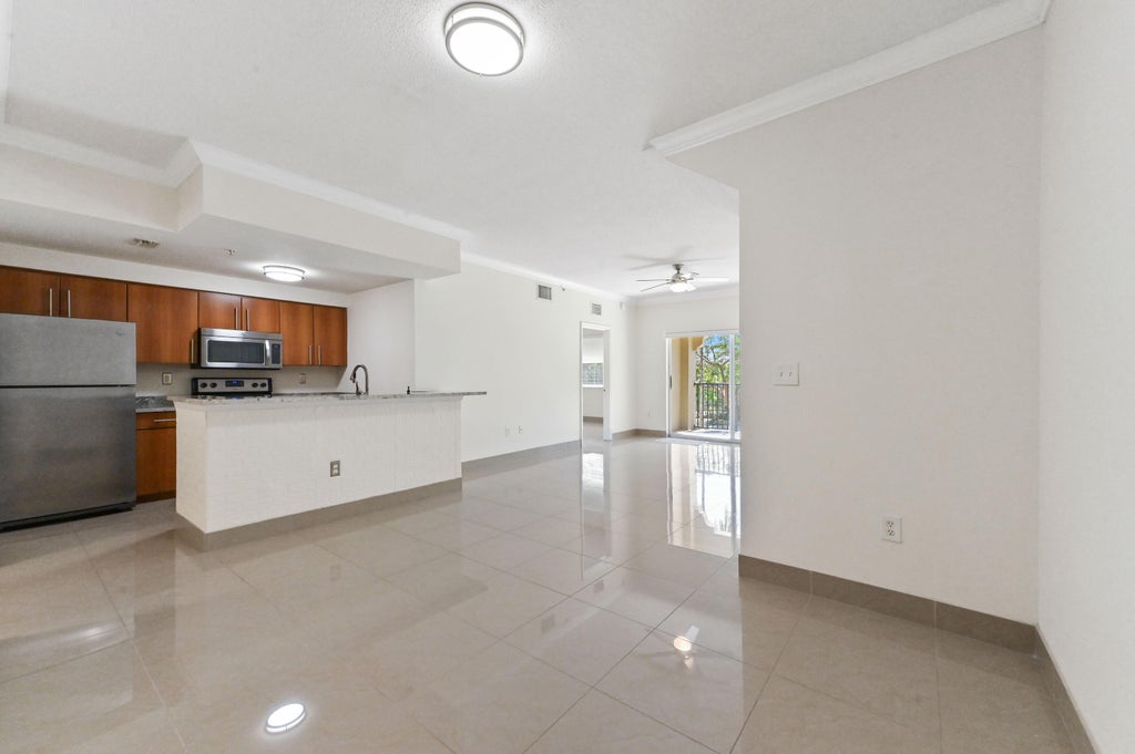 Photo of 6020 W Sample Road #204, Coral Springs, FL 33067 (MLS # B26070838)