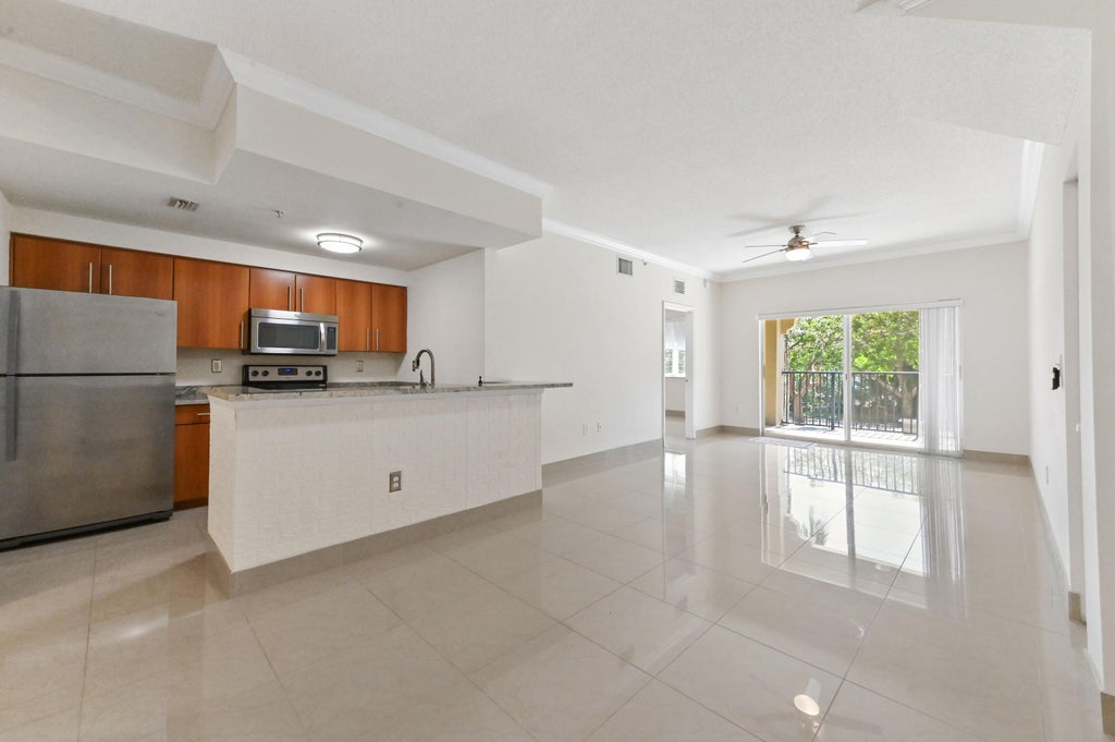 Photo of 6020 W Sample Road #204, Coral Springs, FL 33067 (MLS # B26070838)