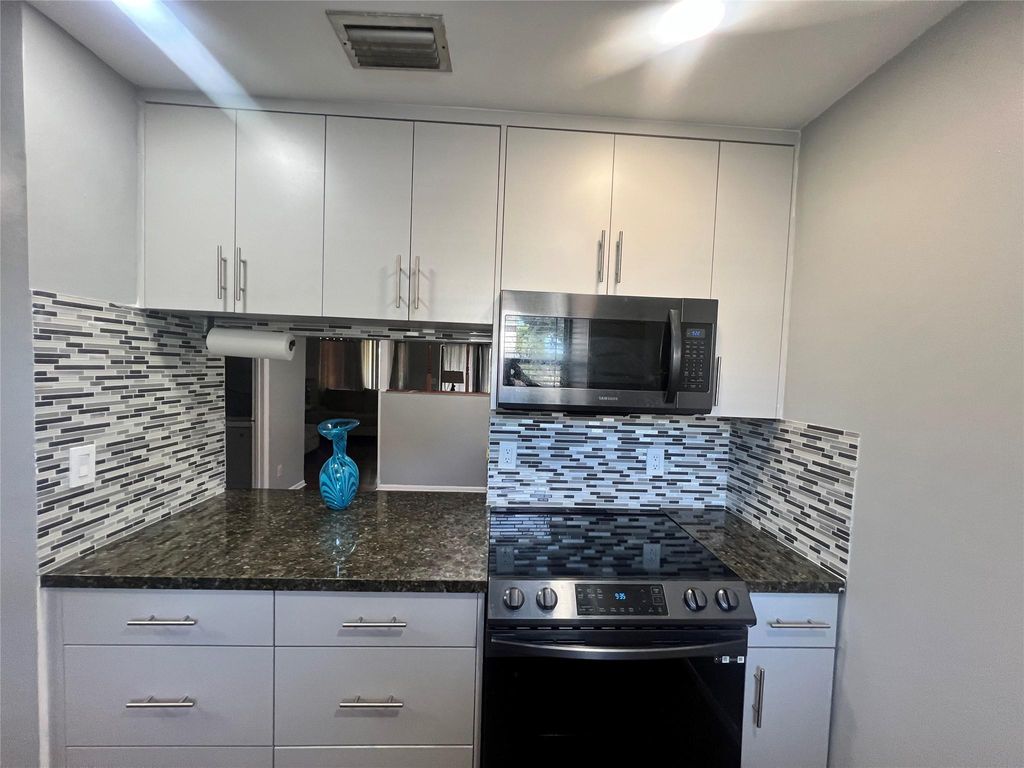 Photo of 3602 Inlet Circle, Greenacres, FL 33463 (MLS # F10491600)