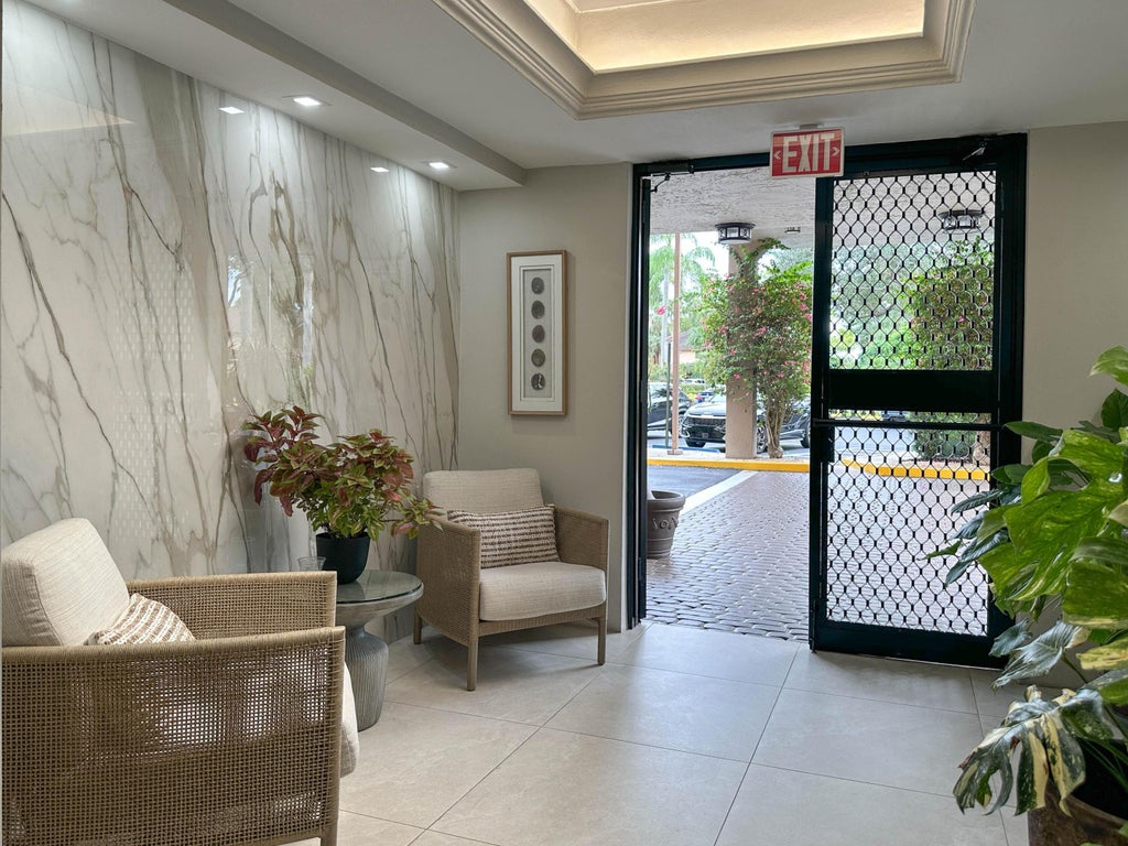 Photo of 5301 FOUNTAINS Drive S #501, Lake Worth, FL 33467 (MLS # B26080759)