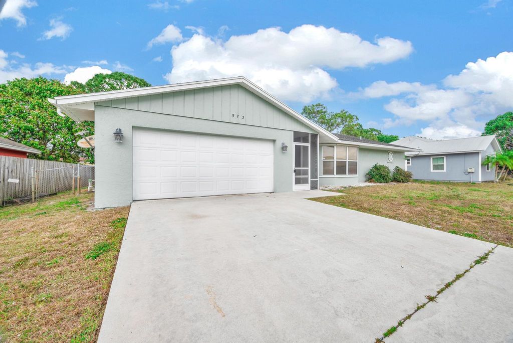 Photo of 573 SW Carter Avenue, Port Saint Lucie, FL 34983 (MLS # R11076481)