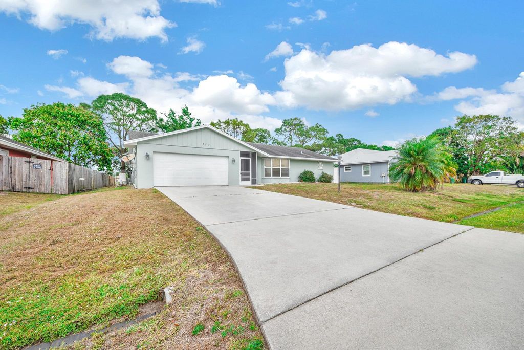 Photo of 573 SW Carter Avenue, Port Saint Lucie, FL 34983 (MLS # R11076481)
