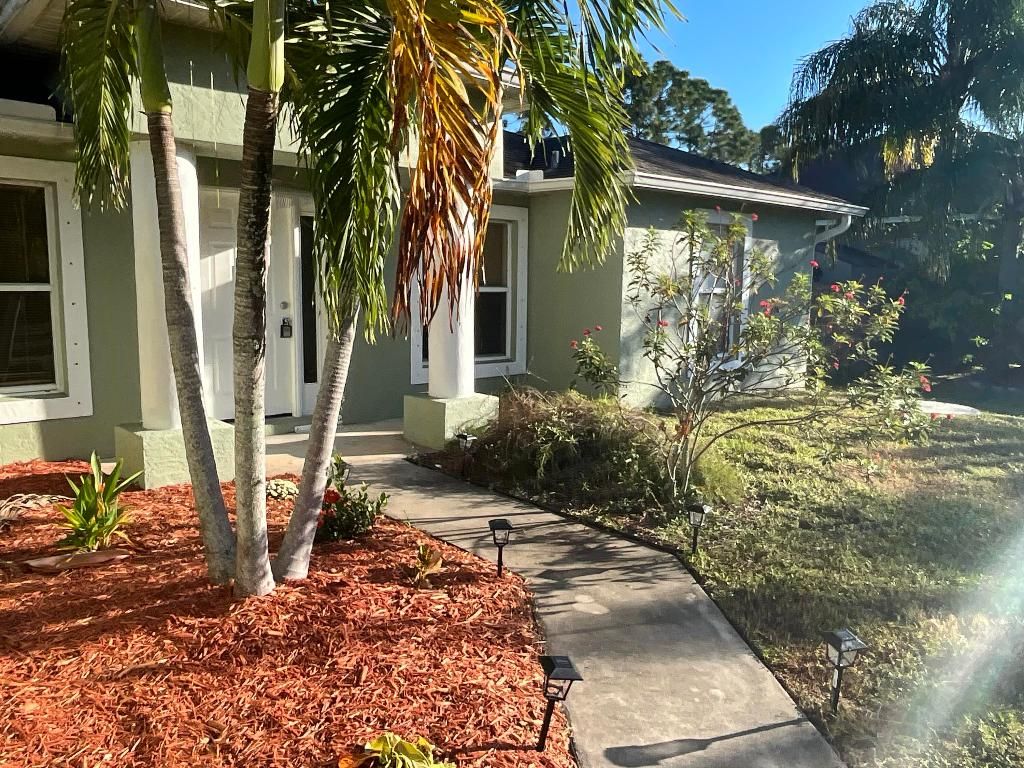 Photo of 1931 SW Fears Avenue, Port Saint Lucie, FL 34953 (MLS # R11145119)