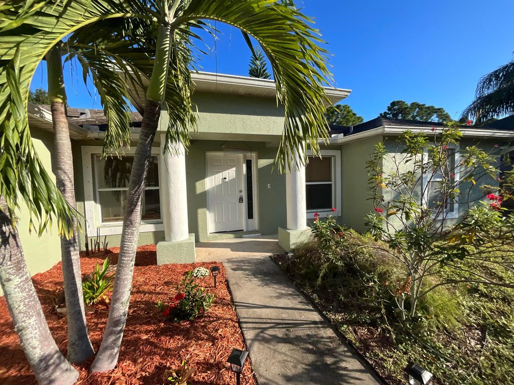 Photo of 1931 SW Fears Avenue, Port Saint Lucie, FL 34953 (MLS # R11145119)