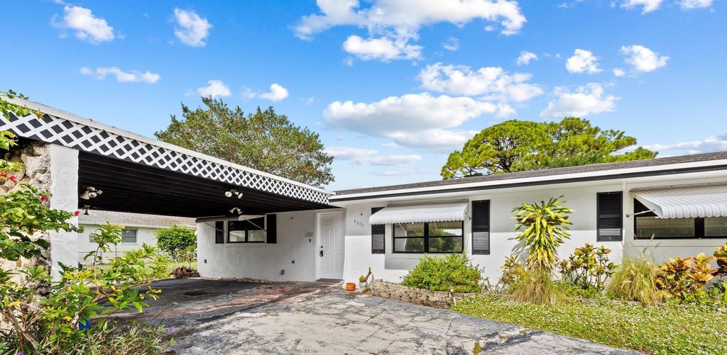 Photo of 4375 Forest Lane, Palm Springs, FL 33406 (MLS # R10944132)