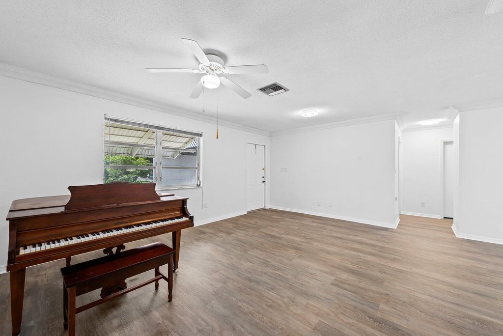 Photo of 4375 Forest Lane, Palm Springs, FL 33406 (MLS # R10944132)