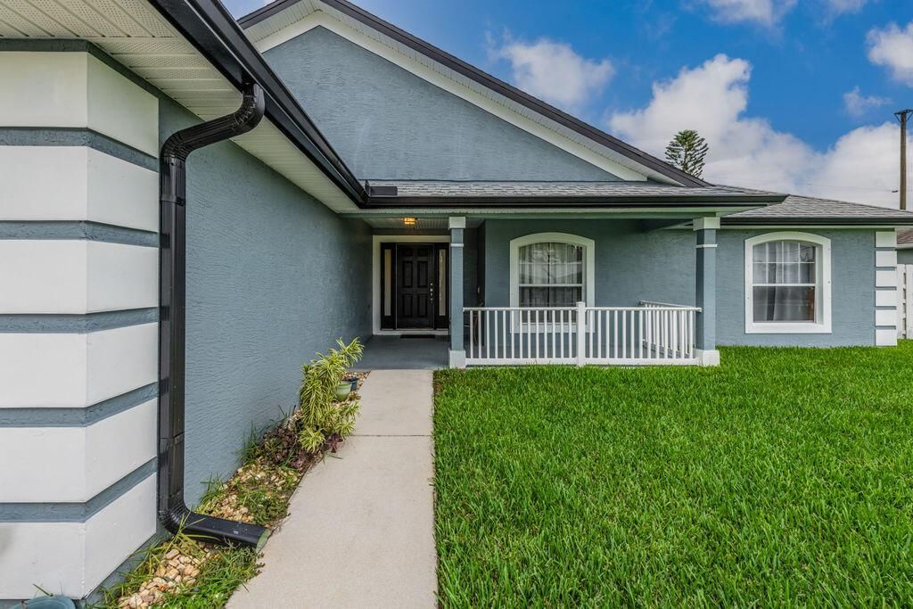 Photo of 2573 SE Hemsing Street, Port Saint Lucie, FL 34984 (MLS # R10939267)