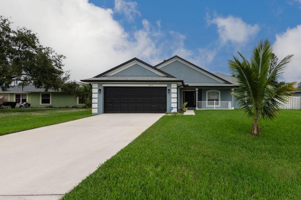 Photo of 2573 SE Hemsing Street, Port Saint Lucie, FL 34984 (MLS # R10939267)