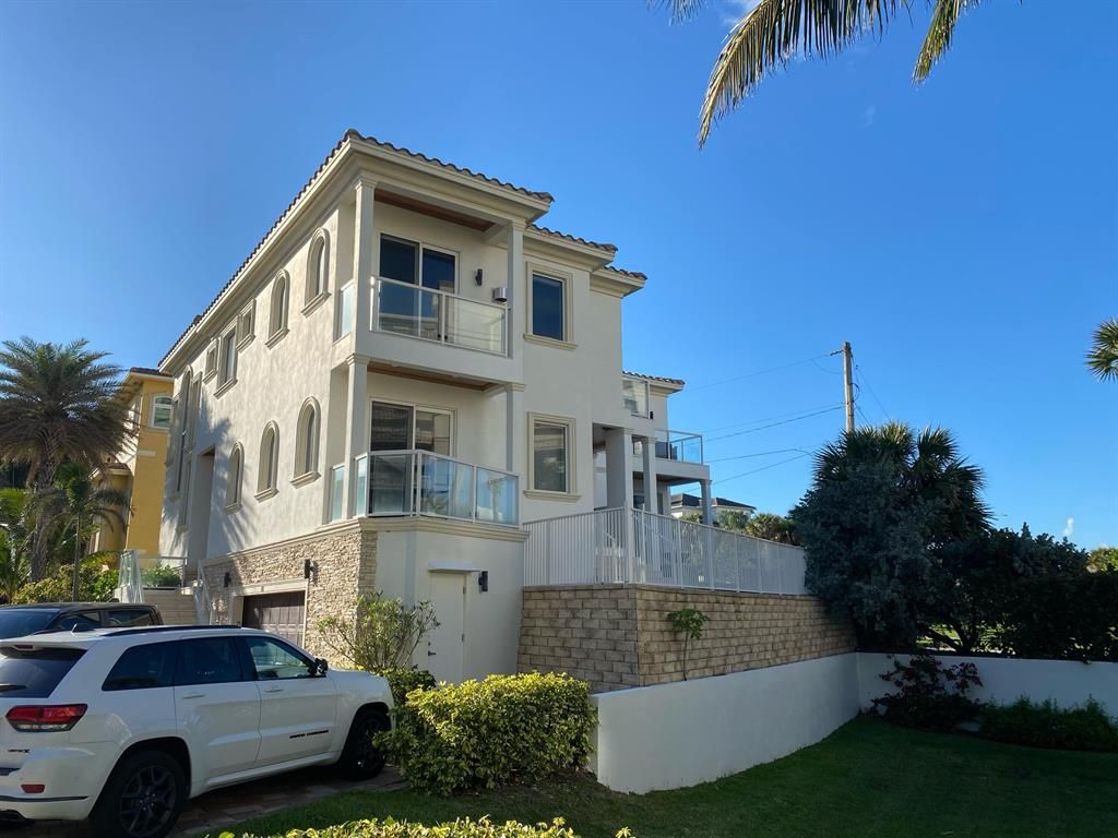 Photo of 441 Surfside Lane, Juno Beach, FL 33408 (MLS # R10695676)