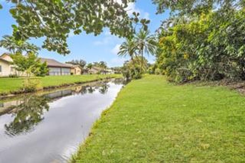 Photo of 1803 NW 88th Way, Coral Springs, FL 33071 (MLS # F10538729)