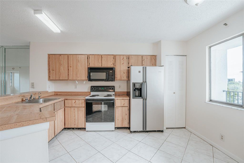 Photo of 2217 Cypress Island Drive #607, Pompano Beach, FL 33069 (MLS # F10420055)