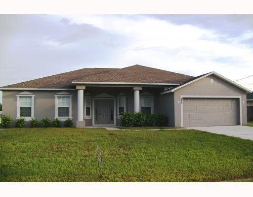 BIG AND SPACIOUS 4/2/2 + DEN & FORMAL DINING RM + ROOFED PATIO AND A FENCED BACKYARD. QUIET STREET