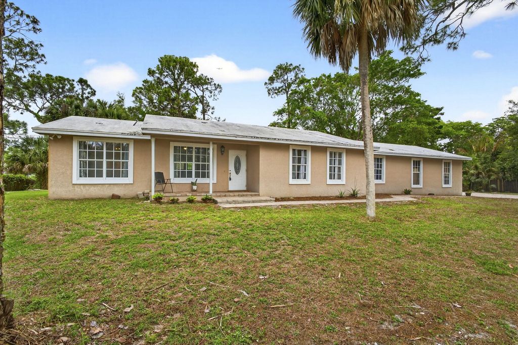 Photo of 16932 Okeechobee Boulevard, The Acreage, FL 33470 (MLS # B26010568)
