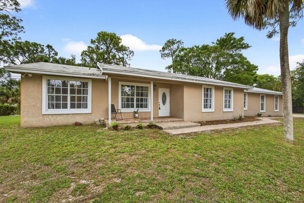 Photo of 16932 Okeechobee Boulevard, The Acreage, FL 33470 (MLS # B26010568)