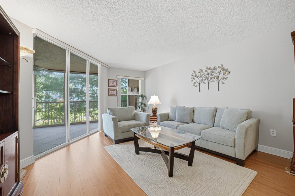 Photo of 7643 Granville Drive #210, Tamarac, FL 33321 (MLS # B26056932)