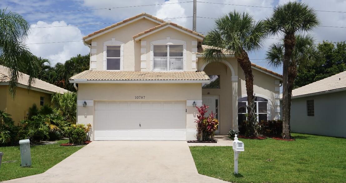 Beautiful 2-story single-family home with a loft ,located in a quiet neighborhood. Features a newer kitchen with granite countertops, impact windoors ,tile and wood flooring, and a covered patio.