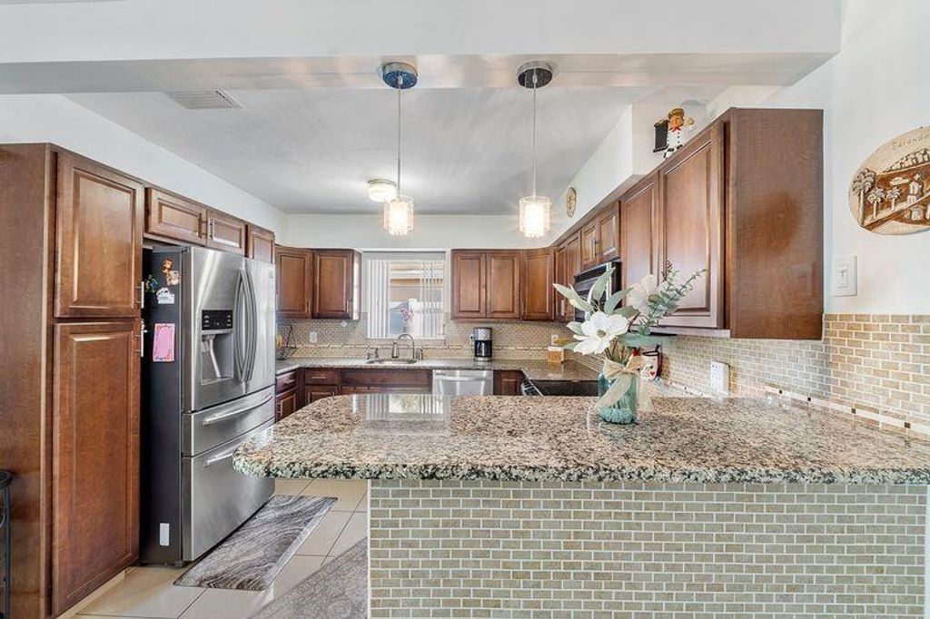 Photo of 4860 N Andrews Avenue, Fort Lauderdale, FL 33309 (MLS # B26013589)