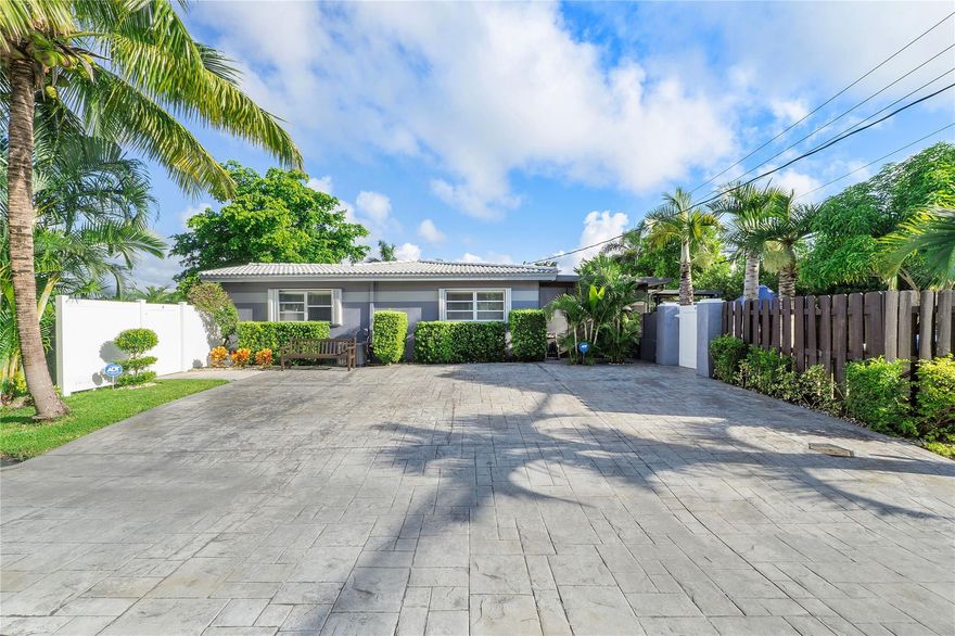 Fully renovated and ideally positioned in one of Fort Lauderdale's most desirable areas, this exceptional 4 bedroom, 2bath residence offers the perfect blend of modern upgrades and versatile living. The home features a beautifully updated interior complemented by brand-new electrical and a new AC system, providing peace of mind for years to come. A standout feature is the private rear suite, ideal as an income-producing efficiency, guest quarters, or a secluded fourth bedroom with its own tranquil garden setting. Conveniently located just minutes from major highways, the airport, pristine beaches, and vibrant downtown Fort Lauderdale, you'll enjoy effortless access to world-class dining, entertainment, and everything South Florida has to offer.  Fully renovated and ideally positioned in one of Fort Lauderdale's most desirable areas, this exceptional 4-bedroom, 2-bath residence offers the perfect blend of modern upgrades and versatile living. The home features a beautifully updated interior complemented by brand-new electrical and a new AC system, providing peace of mind for years to come. A standout feature is the private rear suite, ideal as an income-producing efficiency, guest quarters, or a secluded fourth bedroom with its own tranquil garden setting. Conveniently located just minutes from major highways, the airport, pristine beaches, and vibrant downtown Fort Lauderdale, you'll enjoy effortless access to world-class dining, entertainment, and everything South Florida has to offer.