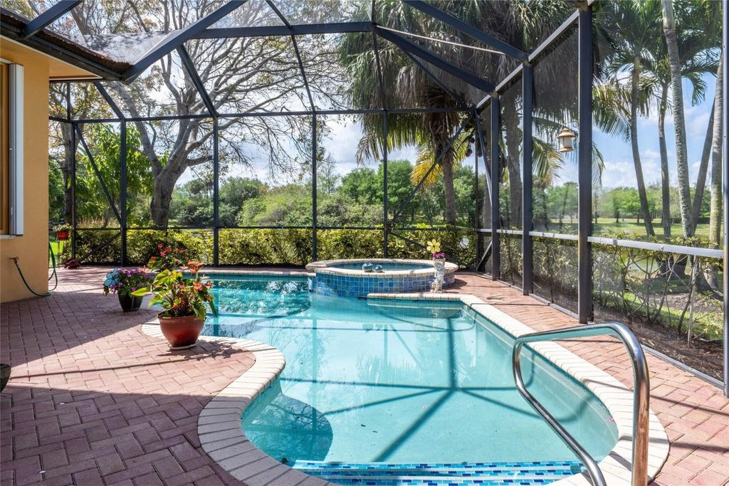 Photo of 10758 NW 83rd Court, Parkland, FL 33076 (MLS # F10498720)