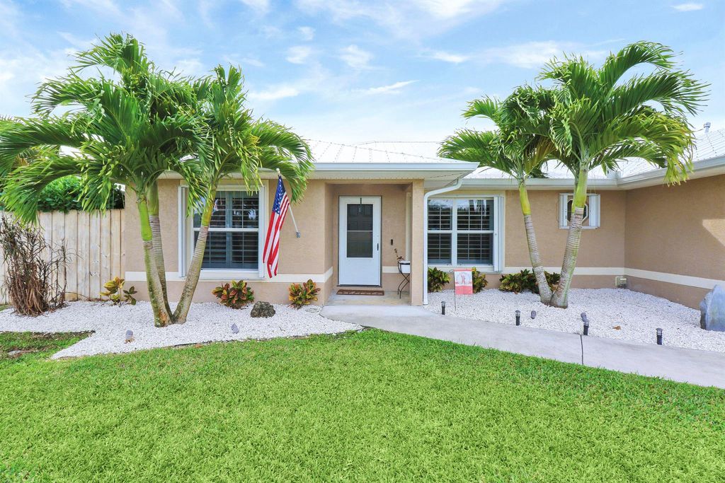 Photo of 1202 SW Lawndale Avenue, Port Saint Lucie, FL 34953 (MLS # R10966481)