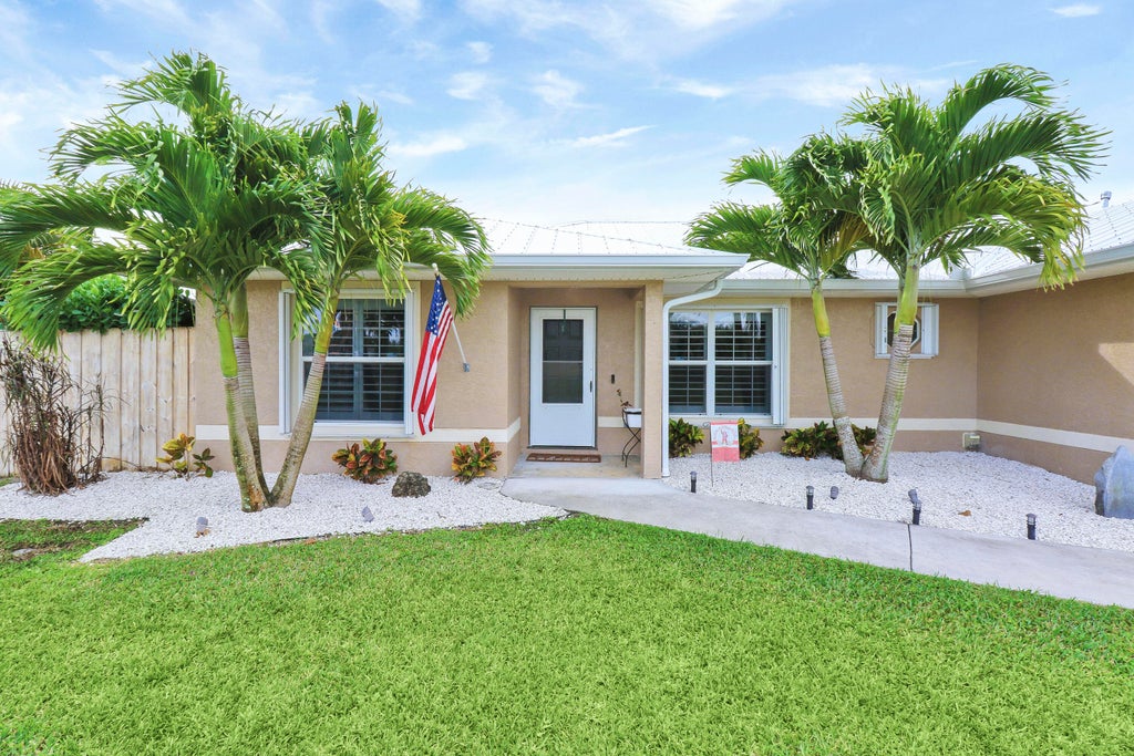 Photo of 1202 SW Lawndale Avenue, Port Saint Lucie, FL 34953 (MLS # R10966481)