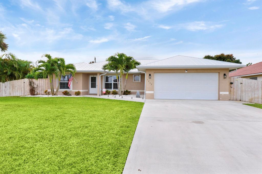 Photo of 1202 SW Lawndale Avenue, Port Saint Lucie, FL 34953 (MLS # R10966481)