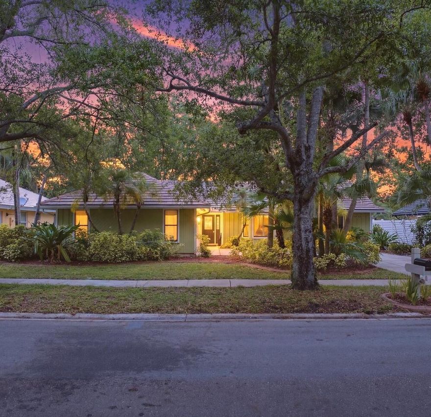 WELCOME TO ONE OF THE MOST COMPELLING OPPORTUNITIES IN THE SHORES OF JUPITER! Offering an ideal location, a desirable 3/2 split floor plan, and a private backyard setting designed for comfortable everyday living. This well-maintained home features approximately 1,870 square feet under air and over 2,400 total square feet of thoughtfully designed space, creating a layout that feels both functional and inviting. The home enjoys a west-facing front exposure, welcoming warm natural light, while the east-facing backyard provides a cooler, more comfortable setting—perfect for morning coffee, outdoor dining, and year-round enjoyment. The covered and screened patio extends your living space outdoors, offering a private, low-maintenance retreat surrounded by mature landscaping and greenery.  Positioned along the tree-lined street of Lake Bend Drive, the property reflects the charm and character that define life in The Shores—an established community known for its shaded streets, scenic lakes, and peaceful setting. Every day, you see folks out and about, walking their dogs, speaking with neighbors, and kids playing in the street. It takes you back to a simpler time. Residents of The Shores enjoy convenient access to Jupiter's beaches, golf courses, shopping, dining, and top-rated schools, with the added benefit of being able to bike to the local elementary school. Offered at $759,000 — schedule your private showing today. As the saying goes, here today, gone tomorrow!