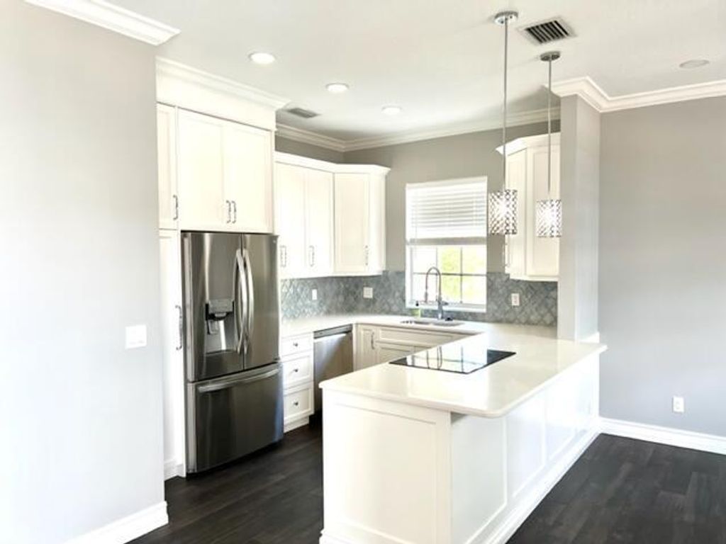 Photo of 10560 SW Stephanie Way Way #1202, Port Saint Lucie, FL 34987 (MLS # R10826062)