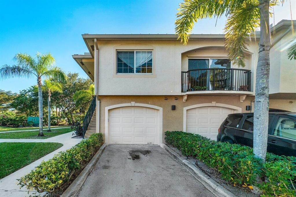 ENJOY this gorgeously updated, 3 bed 2 bath with 1 car and driveway, centrally located to anything you could desire! From the beautiful luxury wood tile flooring, to the amazing new fixtures throughout, with just as equally done beautiful bathrooms, and SS appliances, This home has it all! This wonderful community features two pools, gym, tennis courts, and a great walking path throughout. Once of the best parts is being within walking distances to the grocery store and many other shops, restaurants, and stores! YOU DON'T WANT TO MISS IT!