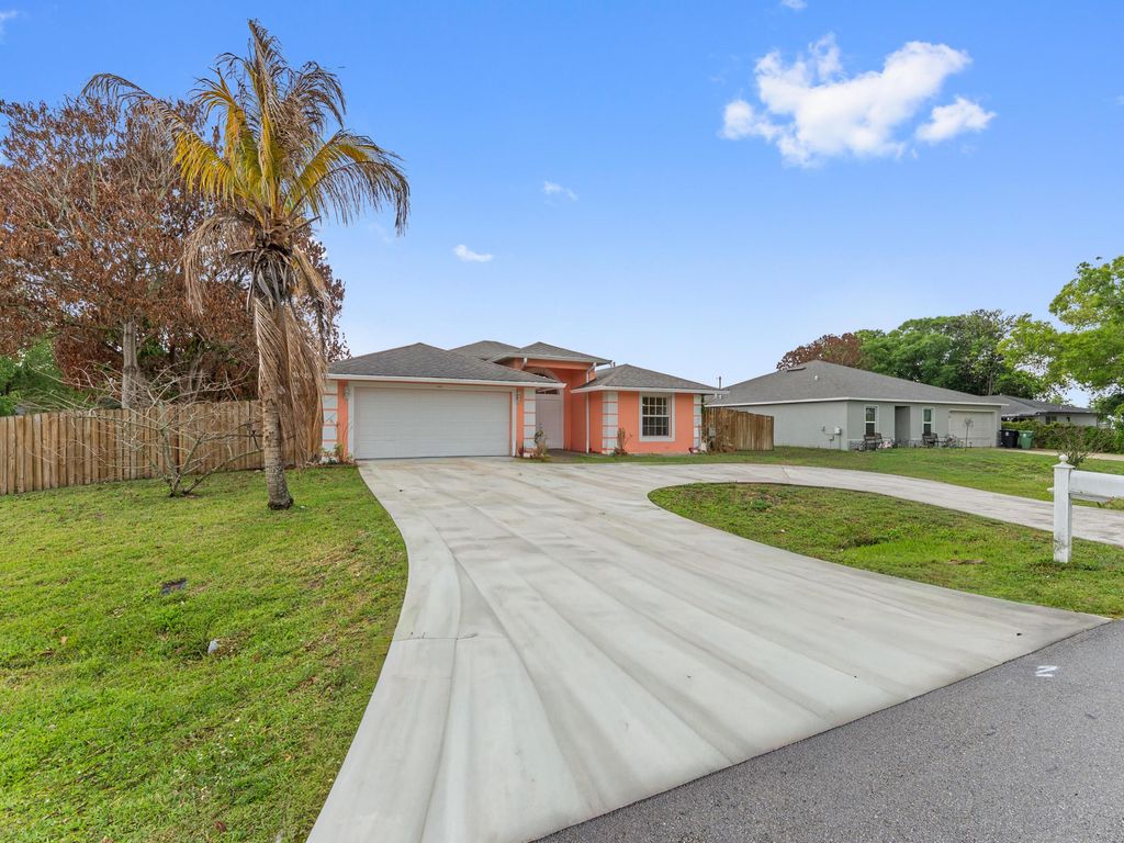 Photo of 430 SE Thanksgiving Avenue, Port Saint Lucie, FL 34984 (MLS # B26003416)