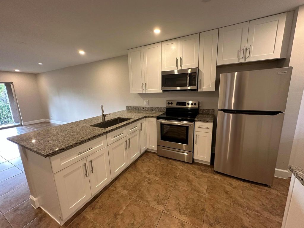 Photo of 2109 SE 3rd Street #C, Boynton Beach, FL 33435 (MLS # R10961271)