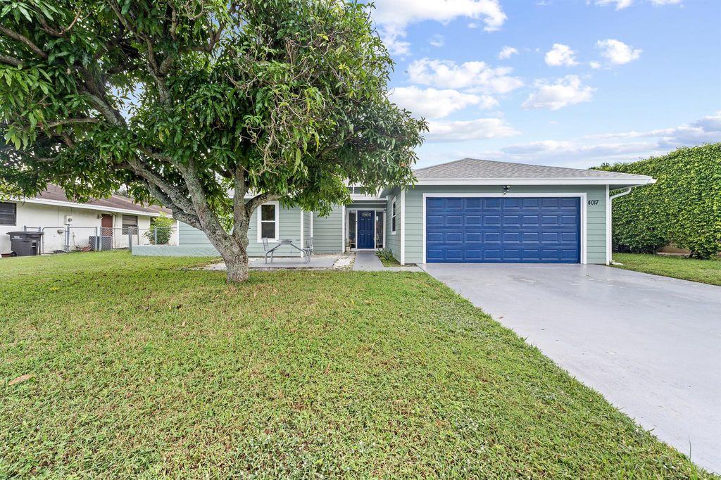 Photo of 4017 Heath Circle S, West Palm Beach, FL 33407 (MLS # R11133546)