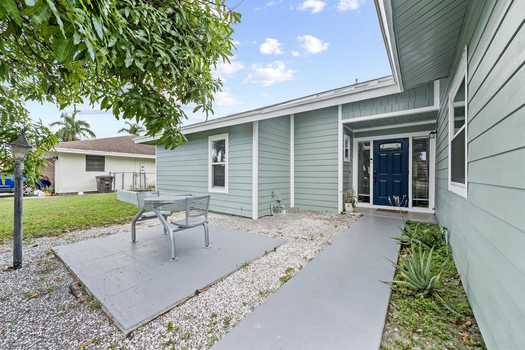 Photo of 4017 Heath Circle S, West Palm Beach, FL 33407 (MLS # R11133546)