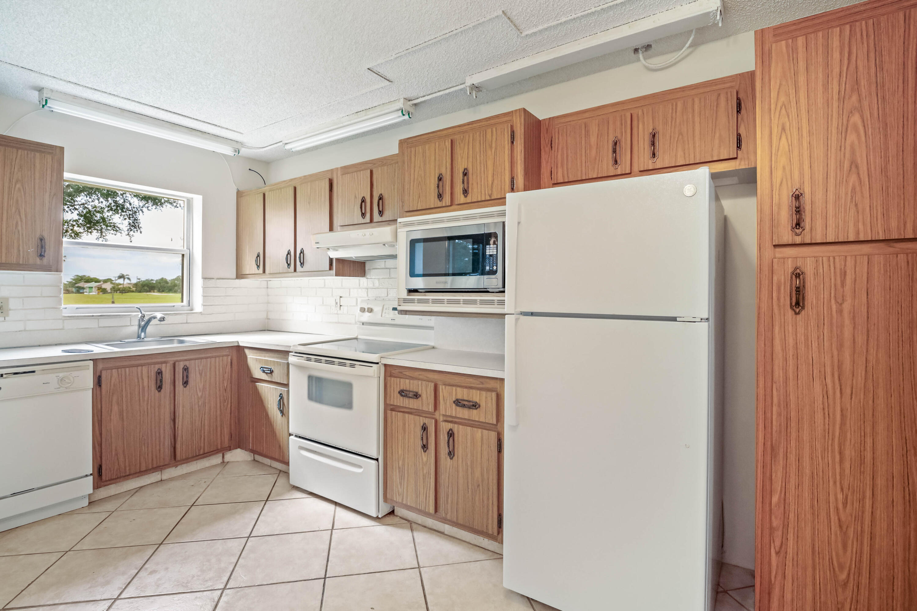 POINCIANA PLACE CONDO 1,2,8 AND 9 - Residential