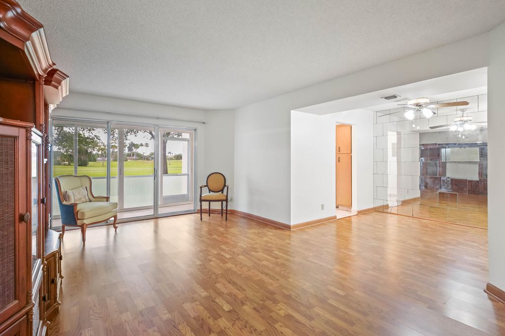 Photo of 3951 Via Poinciana #112, Lake Worth, FL 33467 (MLS # B26035086)