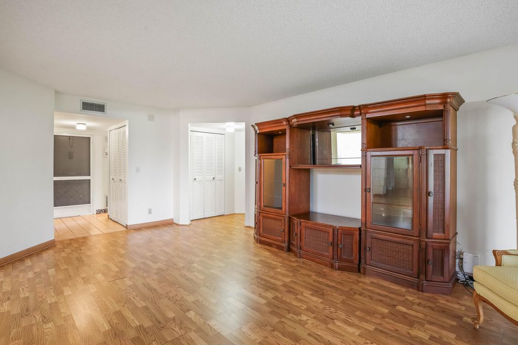Photo of 3951 Via Poinciana #112, Lake Worth, FL 33467 (MLS # B26035086)