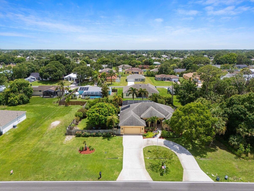 Photo of 1456 SW Del Rio Boulevard, Port Saint Lucie, FL 34953 (MLS # R11113073)