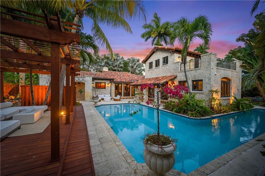 Welcome to Casa Luna, a historic waterfront estate with Old Florida elegance and modern day luxury blended together perfectly! The 4BR/3BA main house and 1BR/1BA guest house w/ 3 car garage features soaring volume ceilings w/exposed wood beams and a gourmet kitchen w/rich wood cabinetry, granite counters and premium stainless appliances, including a natural gas Wolf range along with a Subzero refrigerator and 75 bottle wine cooler. Exquisite primary suite w/wood flooring, 2nd floor meditation loft (including a roof top terrace!) and a jaw-dropping, luxurious bath complete w/wooden double-door entry, impressive mosaic shower and tumbled marble flooring which showcases a breathtaking mosaic inlay. Spectacular wrap-around pool offers the feel of an Italian villa. Perfect for investment!