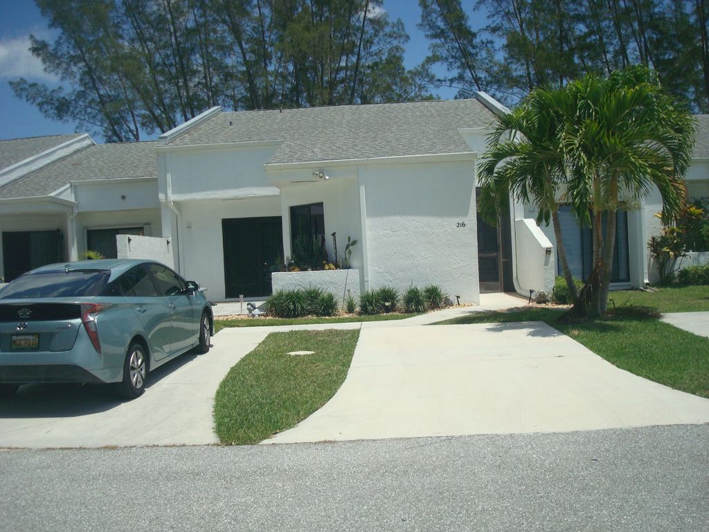 Photo of 216 Par Drive, Royal Palm Beach, FL 33411 (MLS # B26026717)