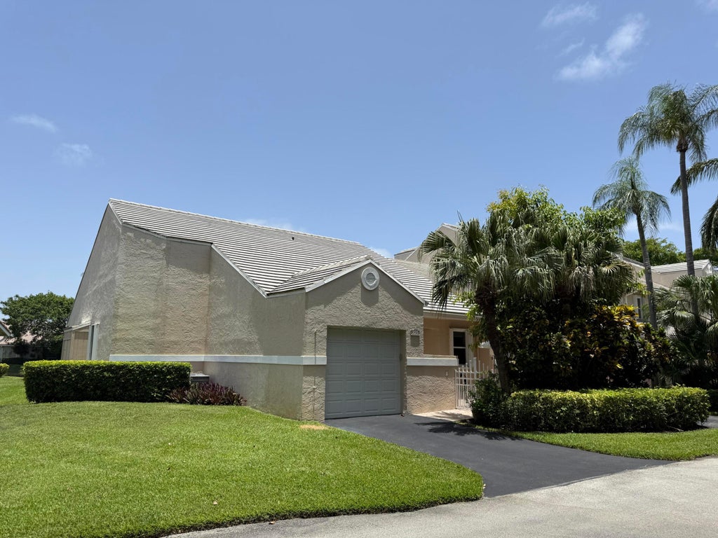 Photo of 225 N Lakeshore Drive, Hypoluxo, FL 33462 (MLS # B26073901)